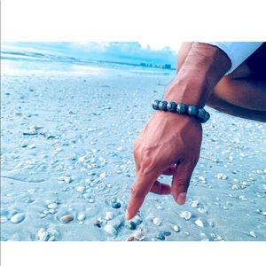 Men’s natural lava stone beaded bracelet. One size fits all